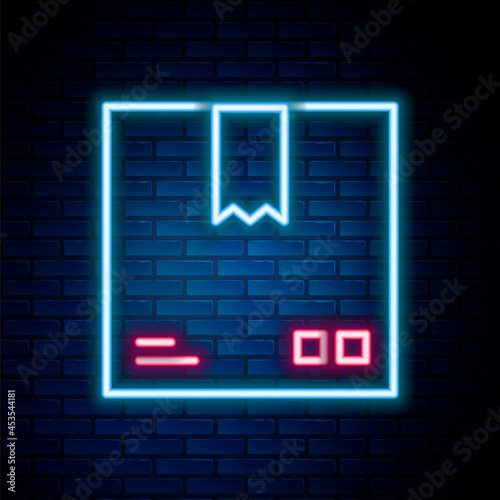Glowing neon line Cardboard box with traffic symbol icon isolated on brick wall background. Box, package, parcel. Delivery, transportation and shipping. Colorful outline concept. Vector