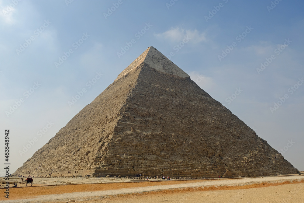 Egypt Cairo - One face of the Pyramid of Khafre in Giza Egypt Cairo - One face of the Pyramid of Khafre in Giza