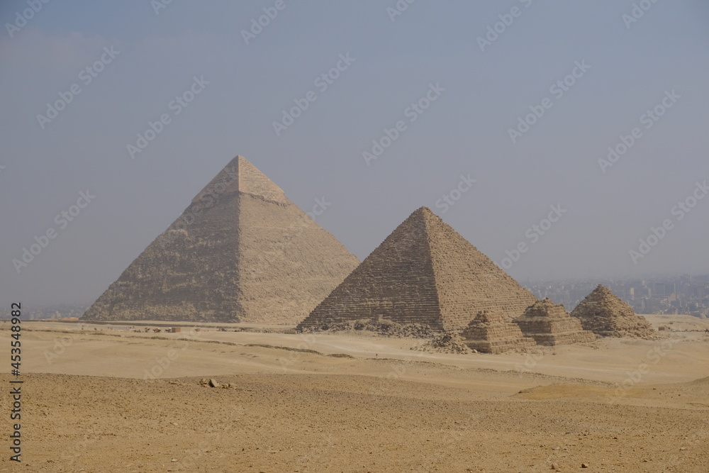 Egypt Cairo - The three main pyramids at Giza and subsidiary pyramids Egypt Cairo - The three main pyramids at Giza and subsidiary pyramids