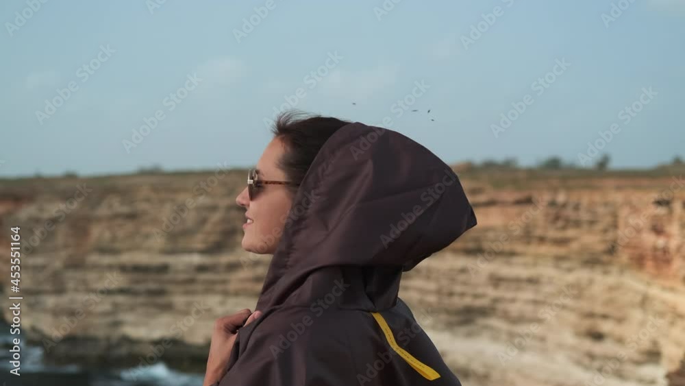 Woman is amazed with sea and island beauty Woman is amazed with sea and island beauty