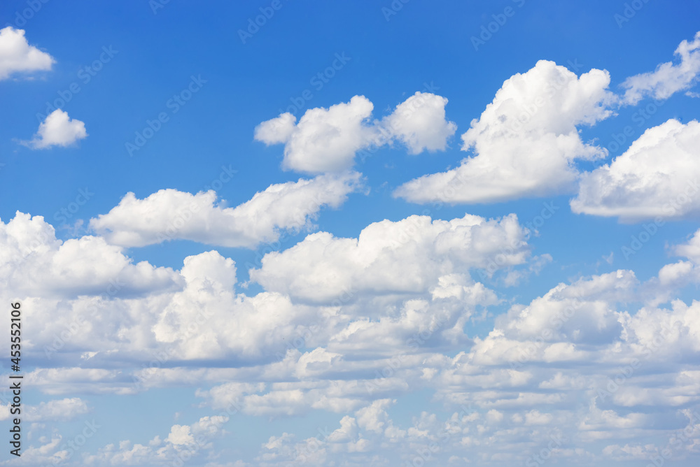 Fototapeta premium beautiful blue sky and white fluffy cloud horizon outdoor for background.