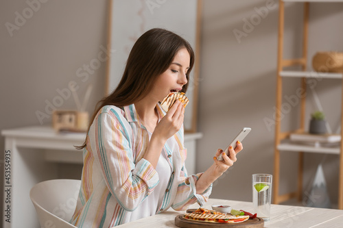 Beautiful young woman with ...