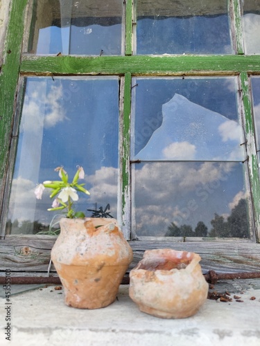 old clay pot on the window