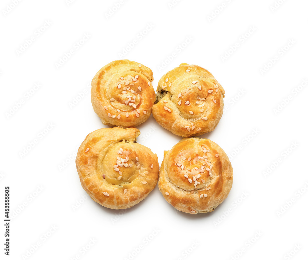 Puff pastry stuffed with spinach on white background Puff pastry stuffed with spinach on white background