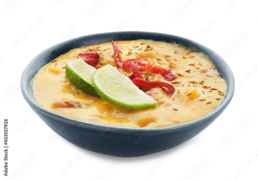 Bowl of tasty chicken curry on white background Bowl of tasty chicken curry on white background