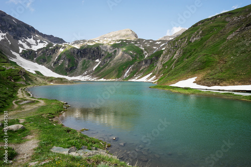 Wonderful alpine lake called Nassfeld Speicher in Hohe Tauern National Park. Austria