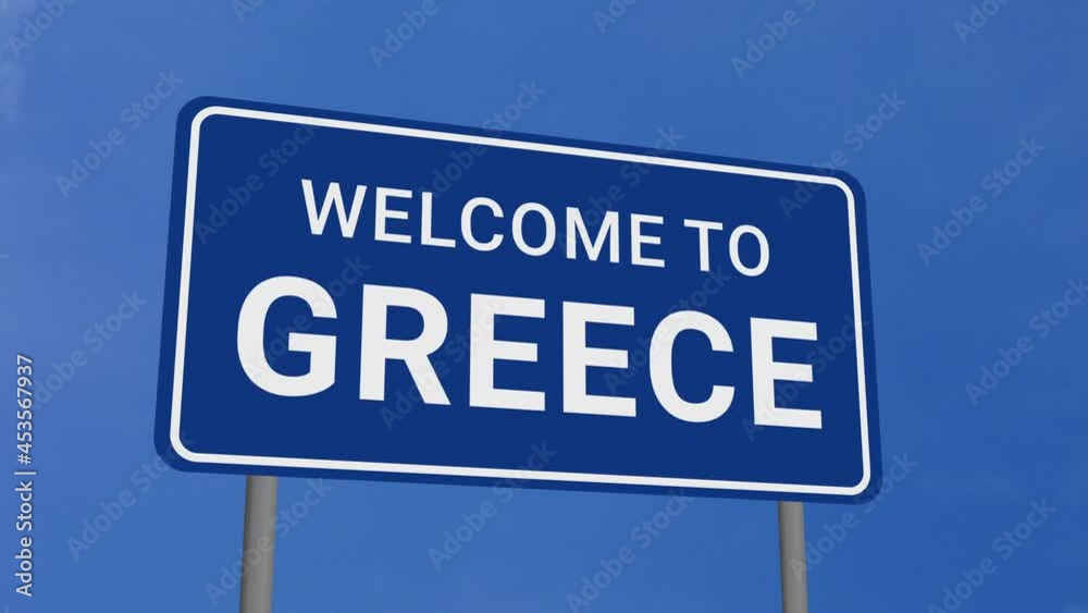 Welcome to Greece Road Sign on Clear Blue Sky with Rapid Moving Clouds Welcome to Greece Road Sign on Clear Blue Sky with Rapid Moving Clouds