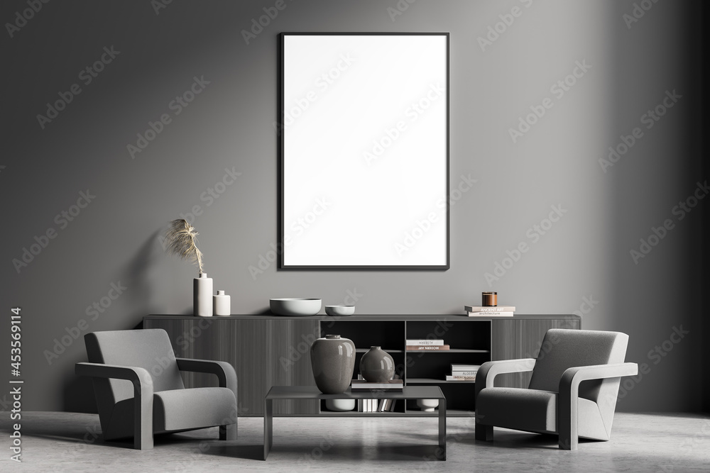 Framed canvas in the dark grey waiting room with two armchairs Framed canvas in the dark grey waiting room with two armchairs