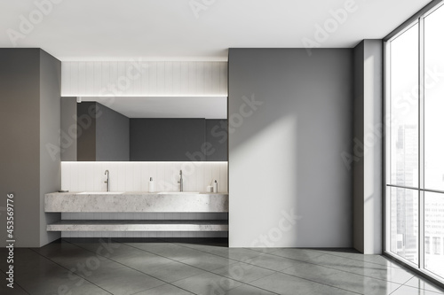 Grey bathroom with vanity and empty wall