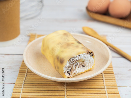 The crepe rolls have a lot of cream and look delicious.