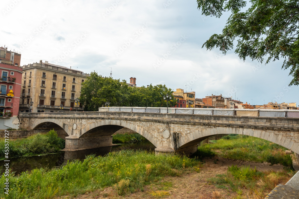 Girona medieval city, bridge over the river Onyar, Costa Brava of Catalonia in the Mediterranean. Spain