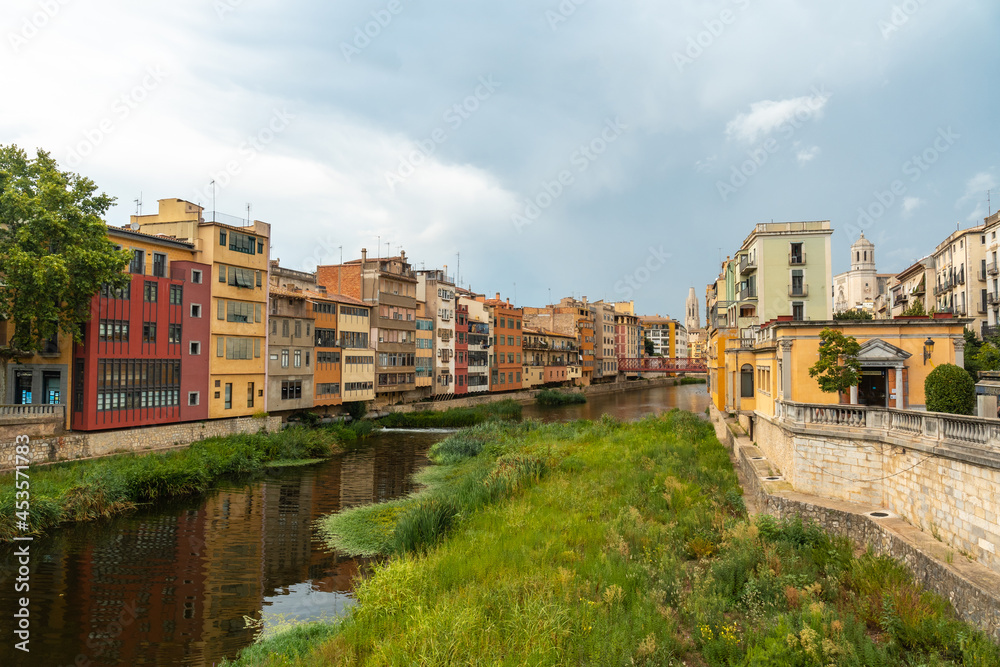 Girona medieval city, traditional colored houses on the Onyar river, Costa Brava of Catalonia in the Mediterranean. Spain