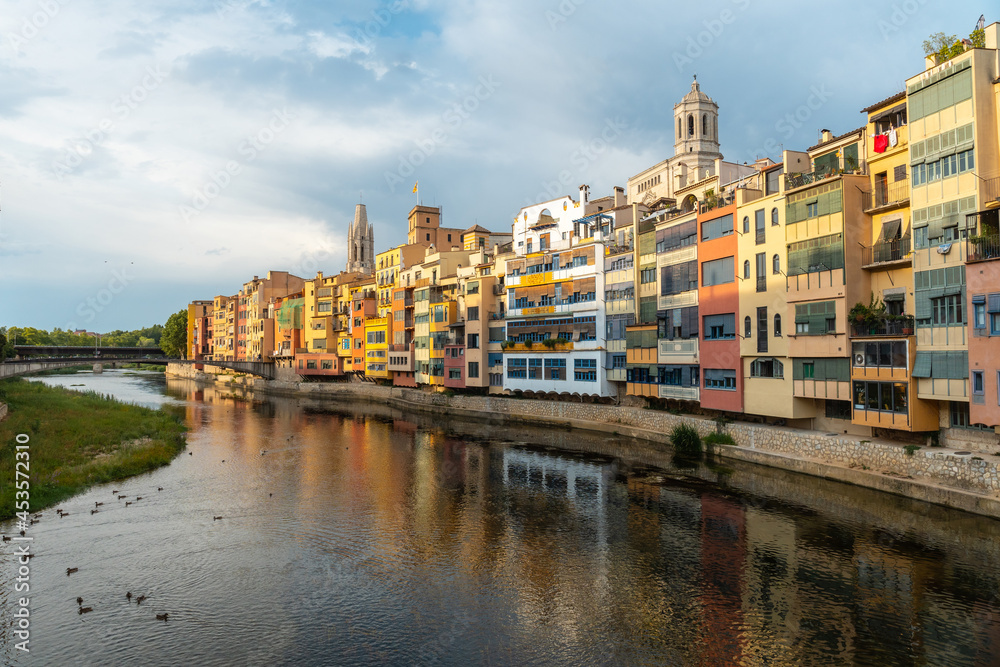 Girona medieval city from the famous red bridge Pont de les Peixateries Velles, Costa Brava of Catalonia