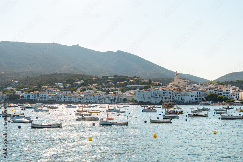 Boats on the beach of the coast of Cadaques, town on the Costa Brava of Catalonia, Gerona, Mediterranean sea. Spain Boats on the beach of the coast of Cadaques, town on the Costa Brava of Catalonia, Gerona, Mediterranean sea. Spain