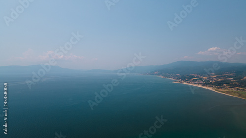Top down drone view of a small tropical island in Macedonia, North Greece © Dimitris