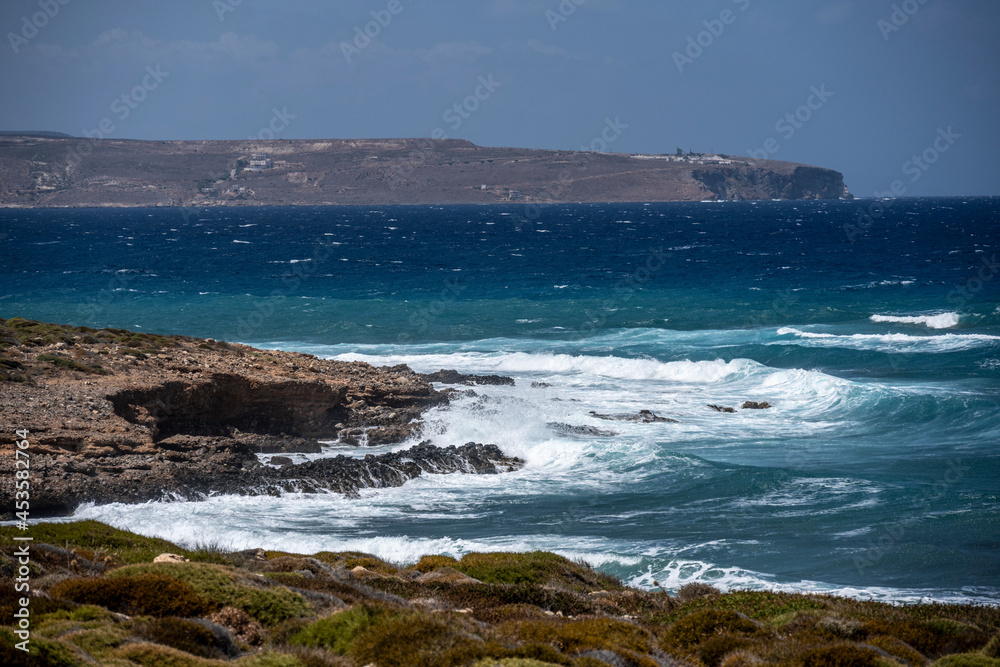 panoramic view from the mountain to the coastal seashore with bays and water of different colors 