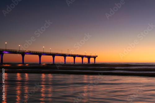 New Brighton Pier during colorful sunrise morning. Christchurch city  New Zealand