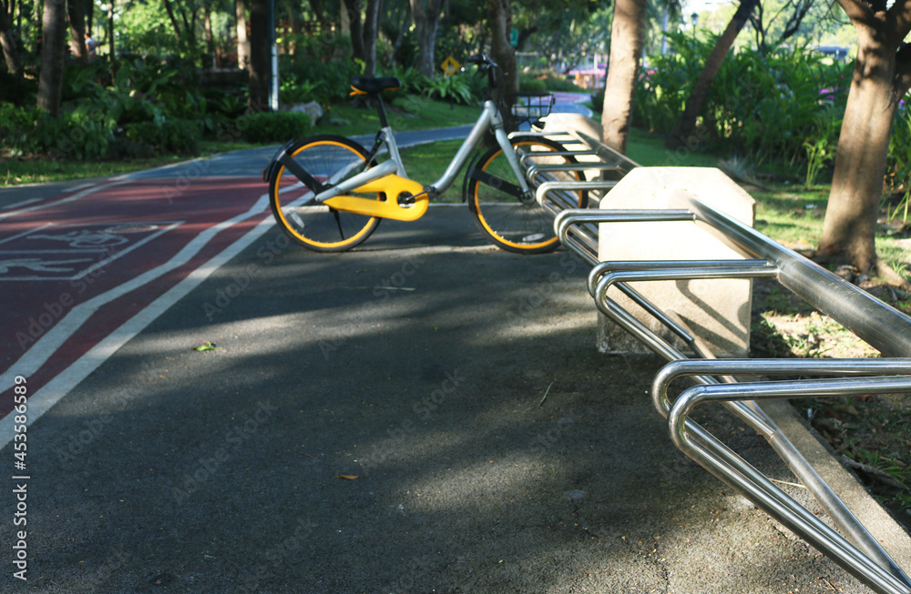 Bicycle parking lot with stainless steel bike rack in the park. Bicycle parking lot with stainless steel bike rack in the park.