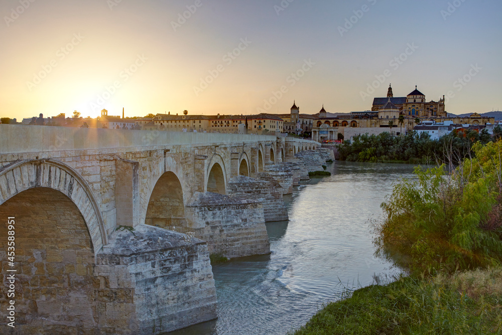 The Roman Bridge over the Guadalquivir river and the Mosque Cathedral of Córdoba, Andalusia, Spain