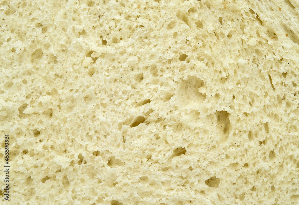 Texture of fresh homemade white bread. Extreme close-up. 