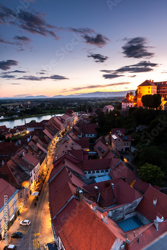 Streets of Ptuj and Ptuj Castle in Slovenia at Sunset