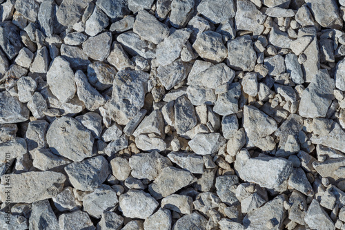 Grey ballast background. Top view.