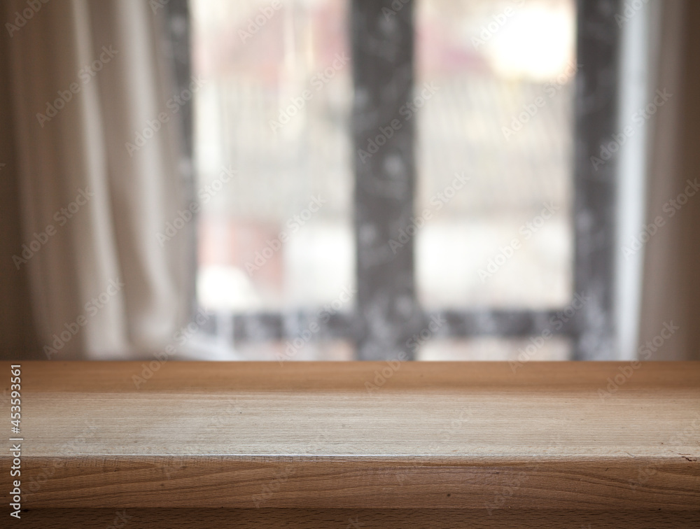 Wooden board for objects on the background of the window in the apartment Wooden board for objects on the background of the window in the apartment
