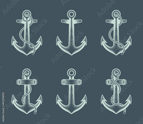 Anchors clip-art collection set. Vector illustration of classic retro nautical anchor in engraving technique.
