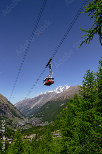 A cable car to glacier pradiser in the swiss alps over Zermatt valley 