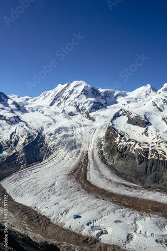 Stunning panorama view of the Gorner Glacier and Monte Rosa massif, Lyskamm peak on Swiss Italian border from Gornergrat station