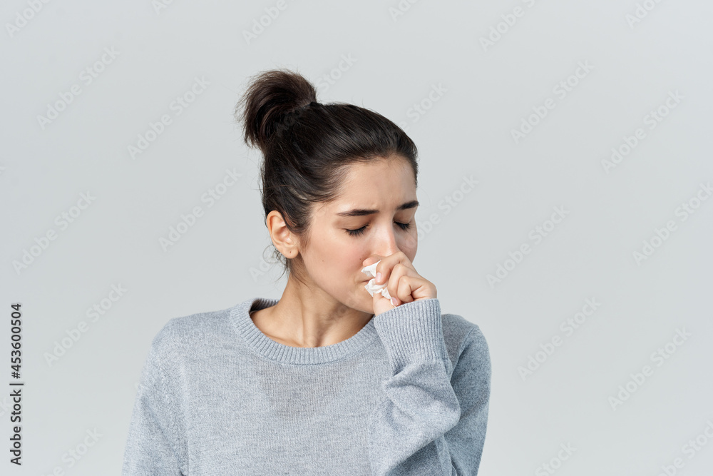 sick woman wipes her face with a handkerchief health problems dissatisfaction sick woman wipes her face with a handkerchief health problems dissatisfaction