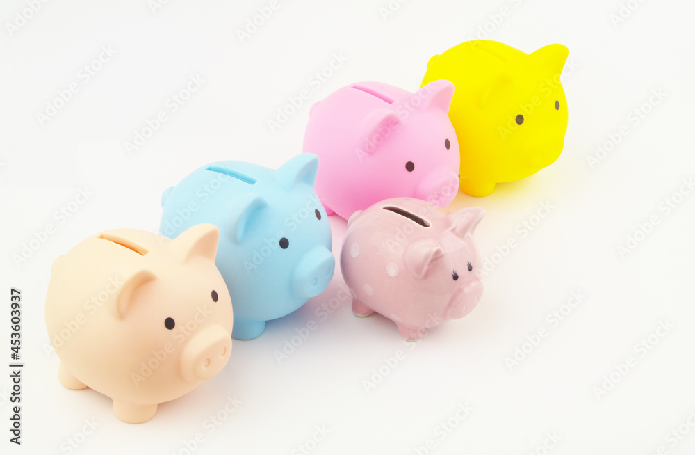 Competition between saving funds concept. Small piggy bank leading against big piggy banks. Success of new invest funds and startup projects.