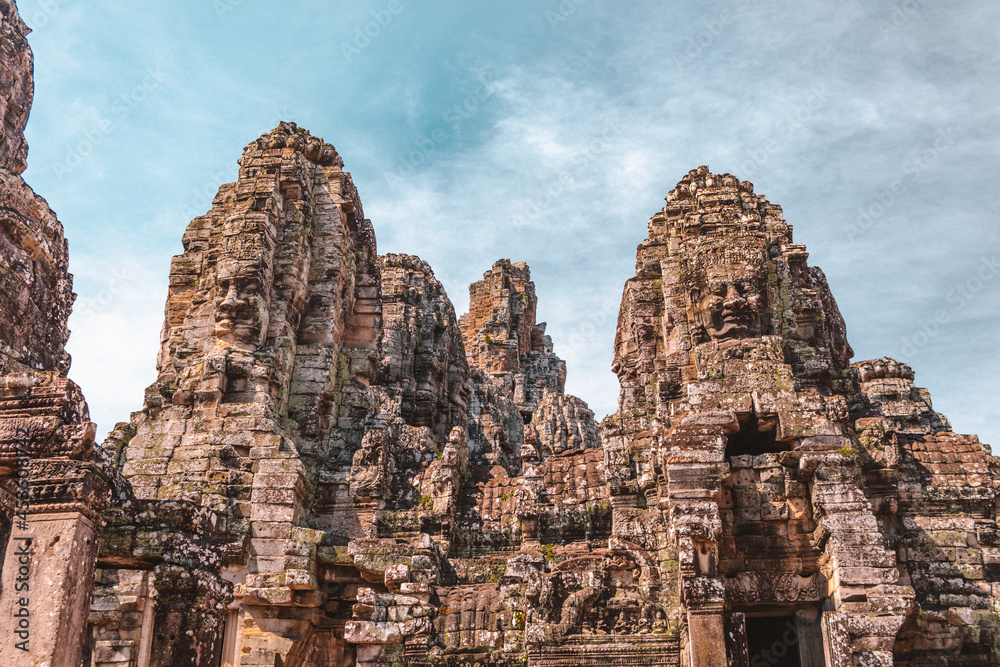 Ancient archaeological site with stone faces in Angkor Wat Cambodia