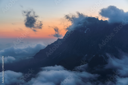 Mountain Zugspitze before sunrise with clouds on the mountain, Austria, Tirol, Ehrwald