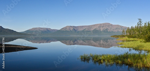 Panorama of a mountain lake on the Putorana plateau. © sergunt