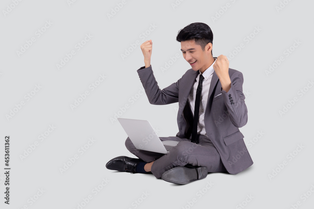 Young asian business man sitting work on laptop computer to internet online isolated on white background, businessman confident and notebook, freelance with success, marketing and communication. Young asian business man sitting work on laptop computer to internet online isolated on white background, businessman confident and notebook, freelance with success, marketing and communication.