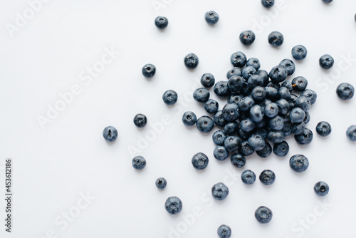 A bunch of ripe, beautiful blueberries, blueberries close-up on a white background. Healthy food, and vitamins.
