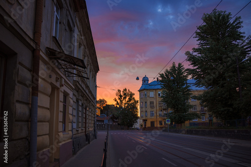 morning dusk purple sky sun rise time old city district silence empty street pavement road