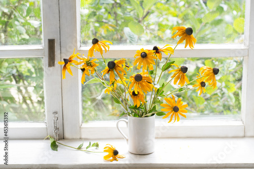 Bouquet of yellow rudbeckia photo