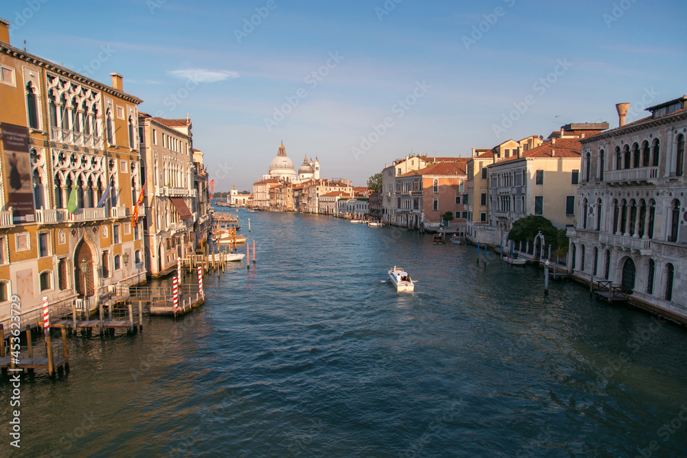 Panoramic view of famous Canal Grande from famous Rialto Bridge at sunset in Venice, Italy