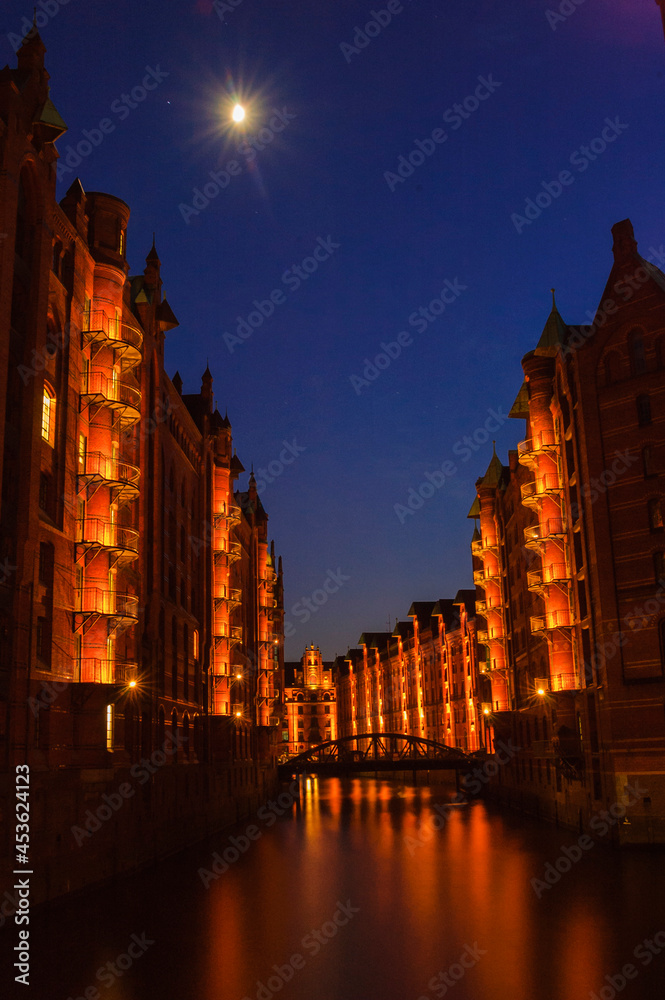 Speicherstadt Hamburg illuminated with river at night long exposure | Hamburg, Germany