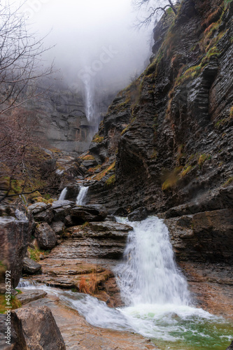 waterfalls of the birth of the nervion in the north of spain, in the province of alava on a cloudy day