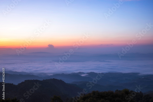 Beautiful sunshine at misty morning mountains at north thailand