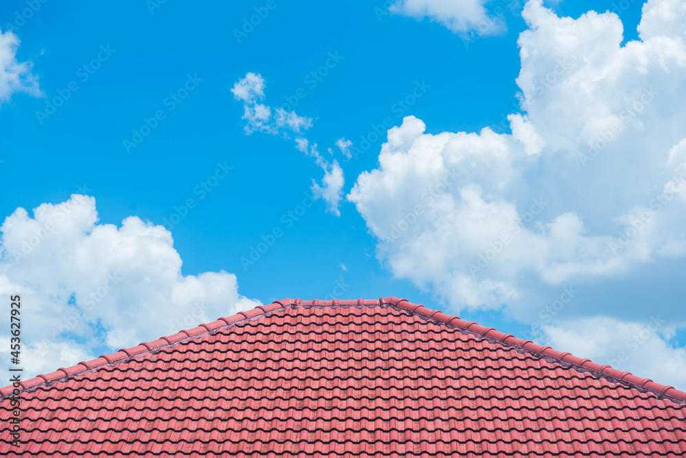 red roof with the blue sky background red roof with the blue sky background