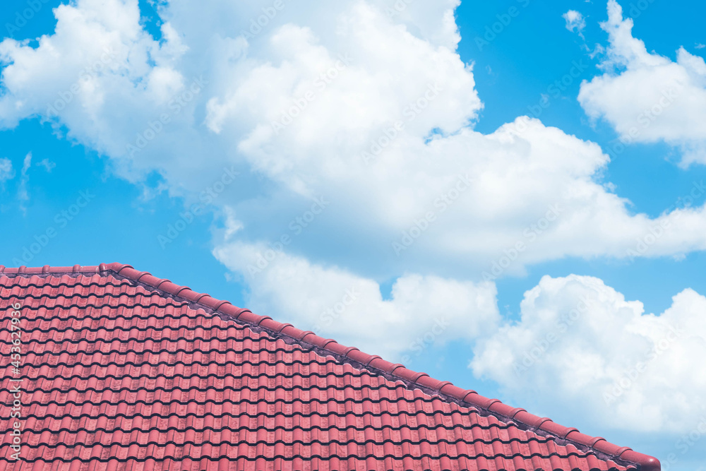 red roof with the blue sky background red roof with the blue sky background