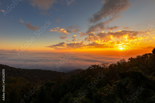 Beautiful sunrise at misty morning mountains © Torsak