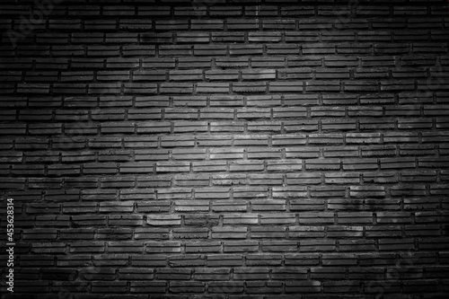 black brick wall texture. dark stone surface  background for design