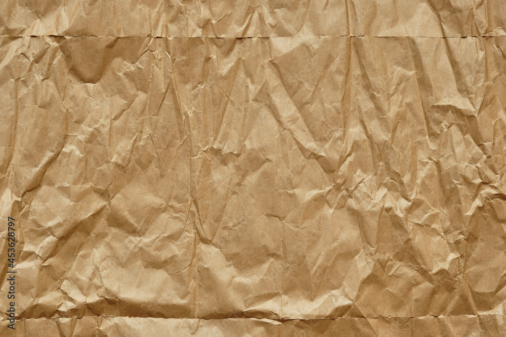 Fototapeta premium Crumpled Brown Paper Texture Background, Creased Wrapping Paper.
