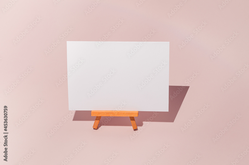 White paper on an easel. Free text space White paper on an easel. Free text space