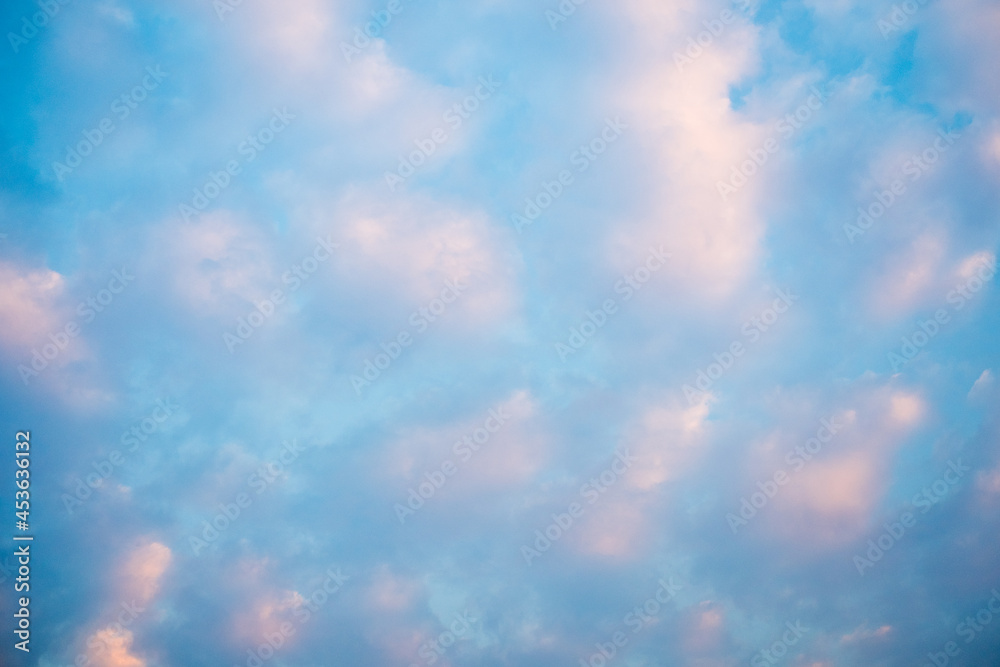 Blue sky with pink cloud, natural background